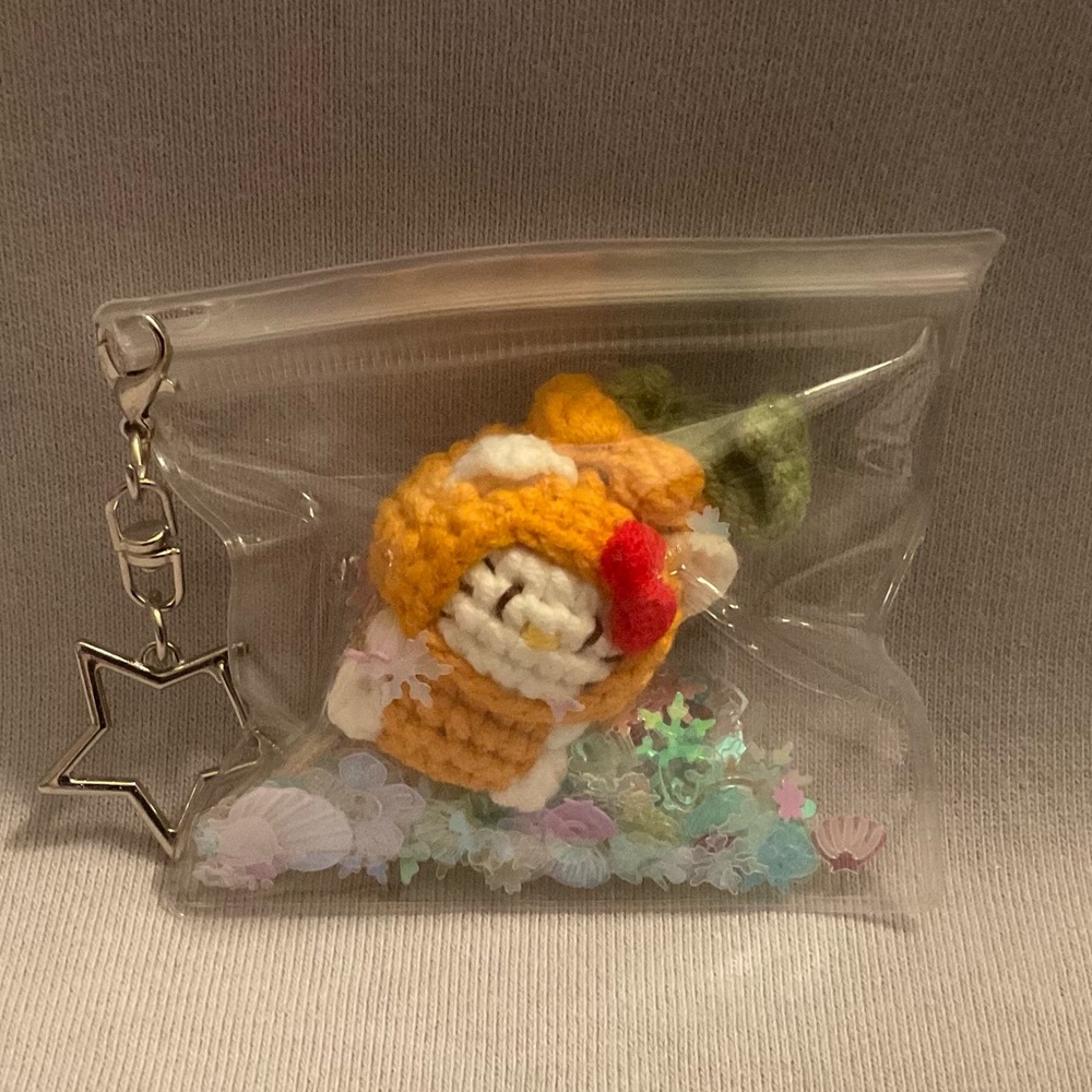 Crocheted Yellow Flower Charm in Clear Mini Pouch